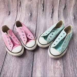 Lot of two girls converse shoes.